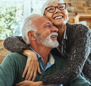 Older couple hugging each other