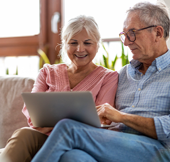 older couple sitting together